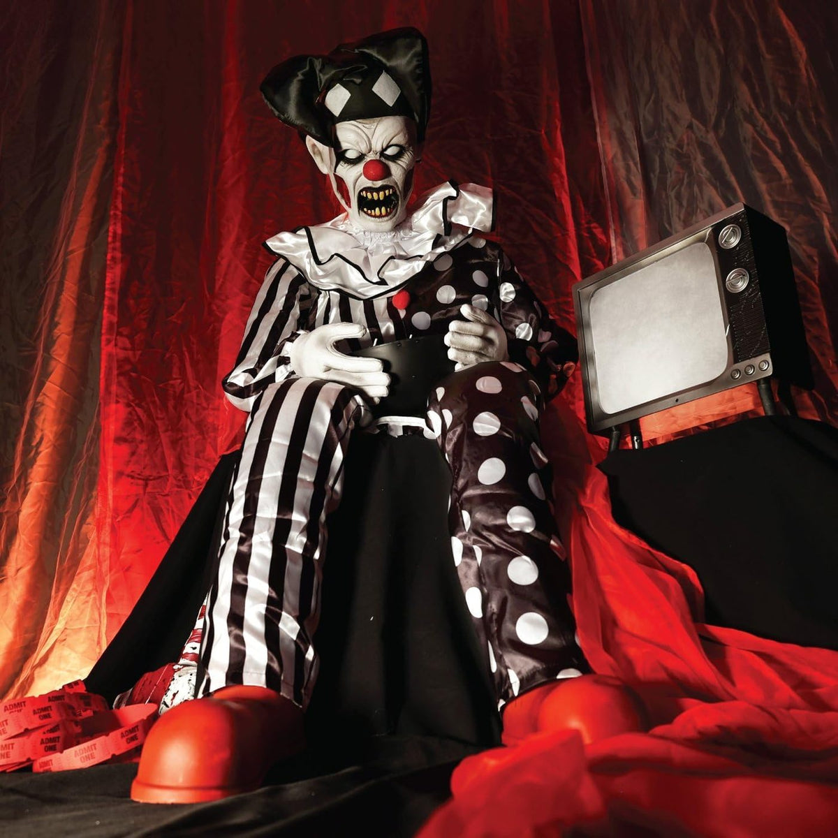 Clown looking down at the candy bowl
